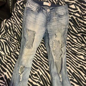Dramatic stylish ripped jeans